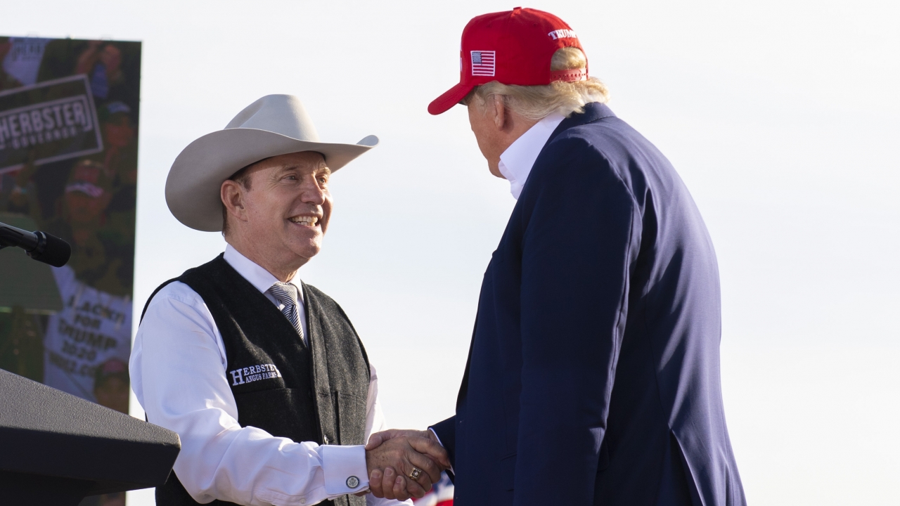 Nebraska GOP gubernatorial candidate Charles Herbster shakes hands with former President Donald Trump