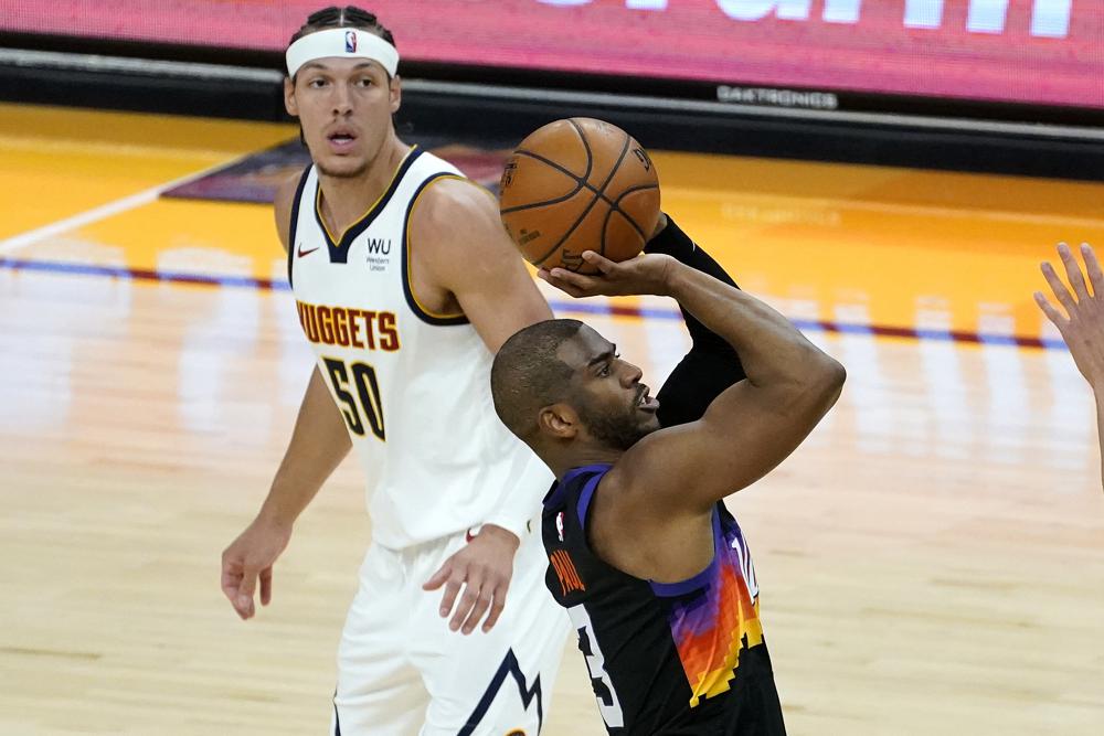 Rejuvenated Paul leads Suns over Nuggets 122-105 in Game 1