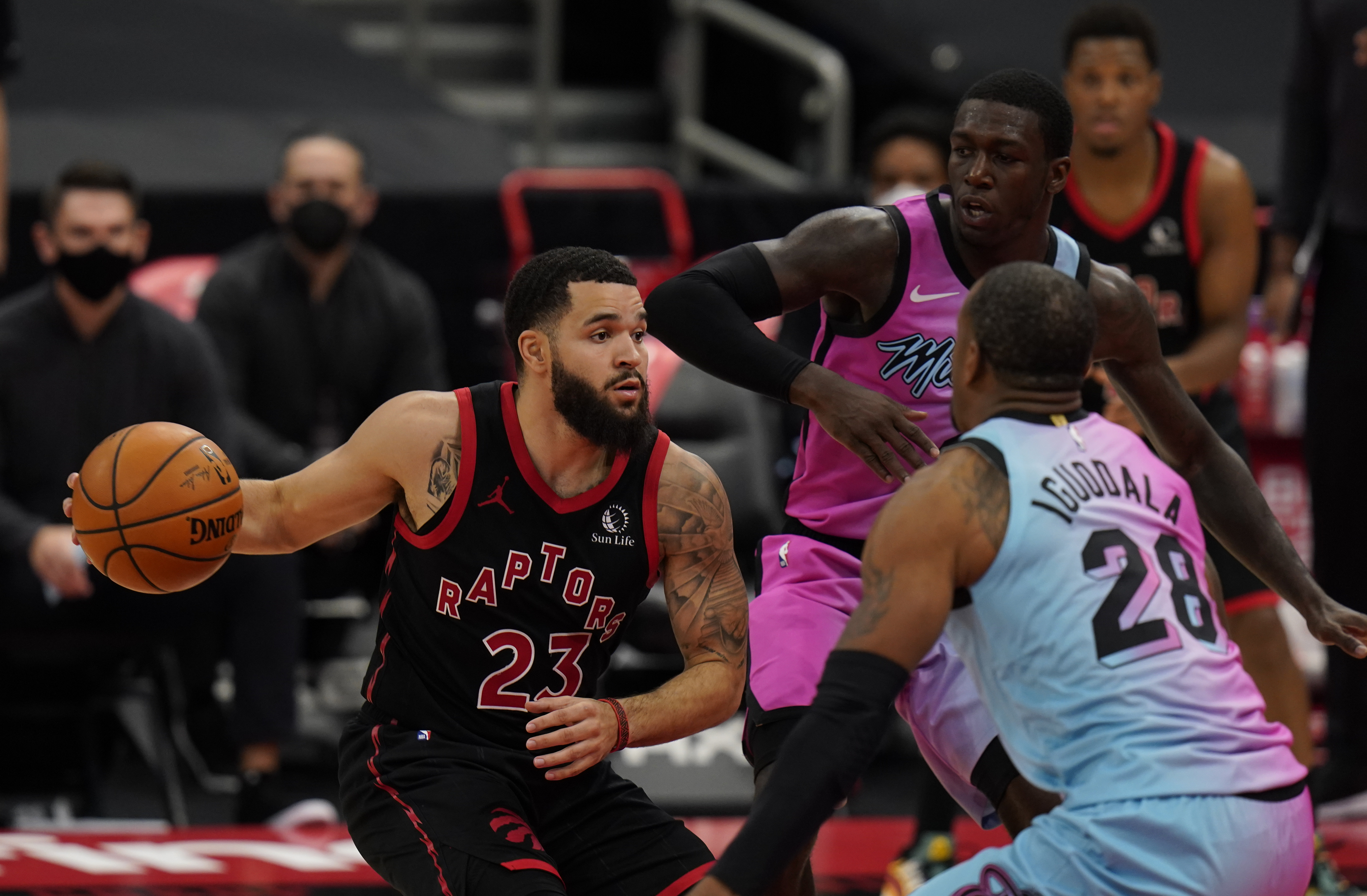 Toronto Raptors guard Fred VanFleet vs. Miami Heat forward Andre Iguodola in Tampa, Jan. 20, 2021