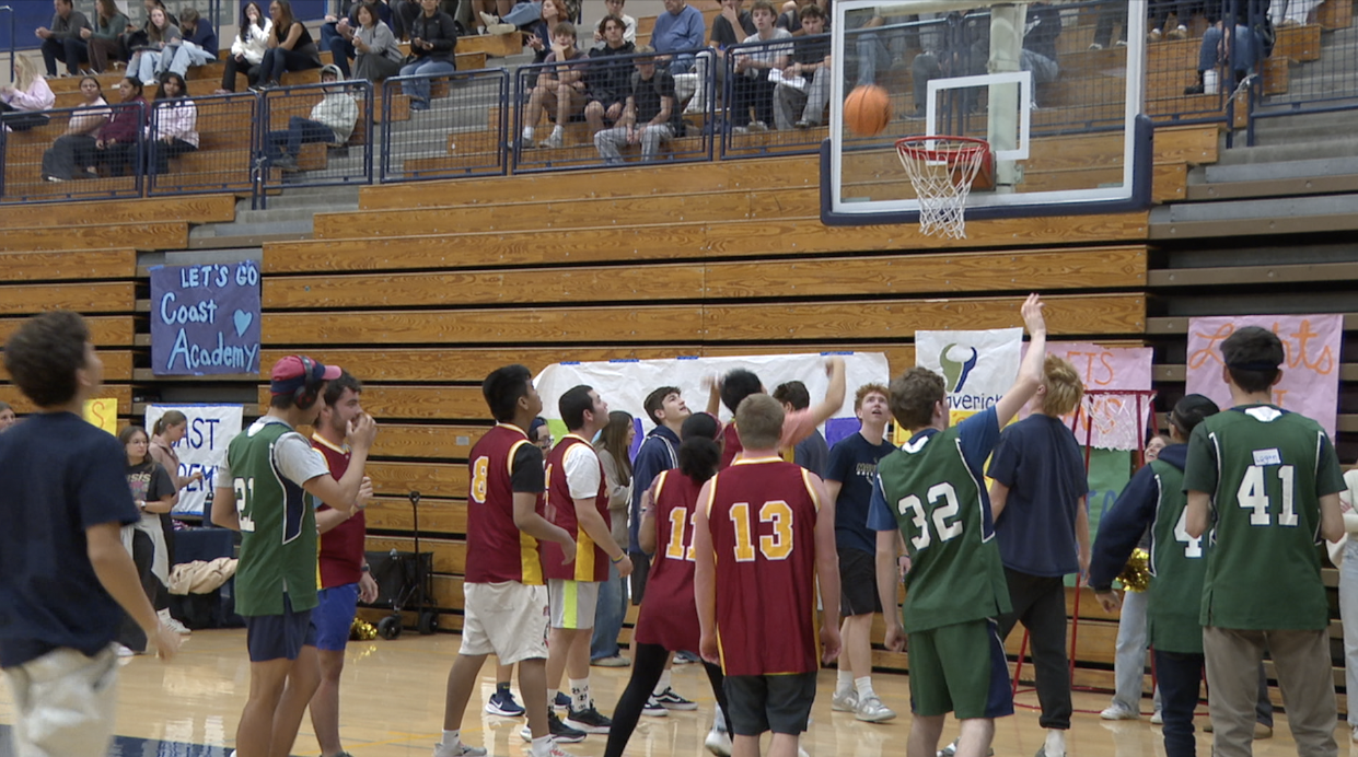 Students with disabilities shooting hoops at the inclusion basketball tournament in Carlsbad. 