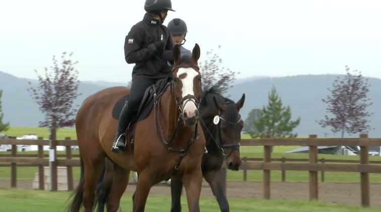 Two riders warm up their horses at Rebecca Farm, Tuesday, July 14, 2026