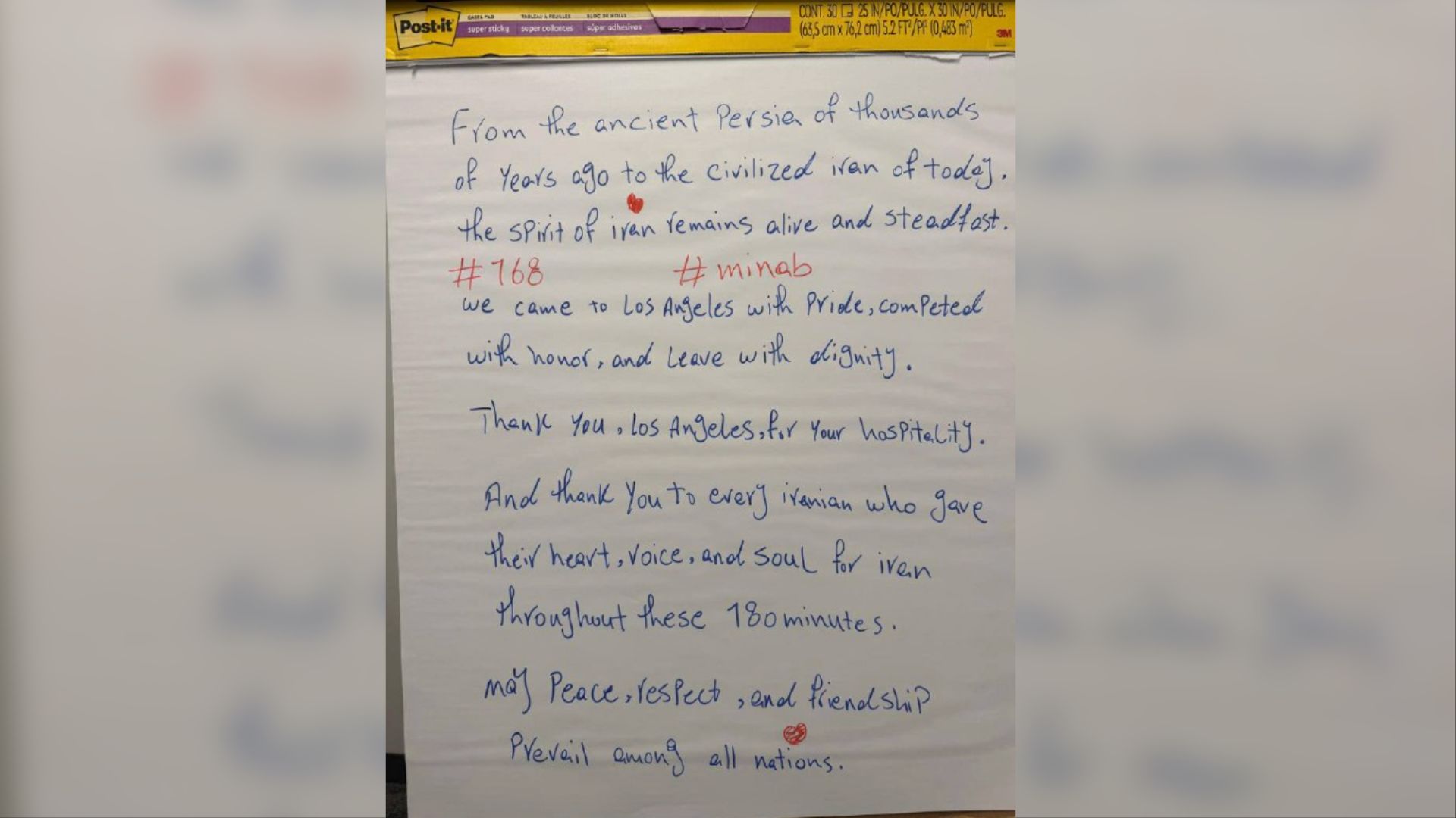 Iran's National Football Team leaves a note of peace in the locker room following group stage match.