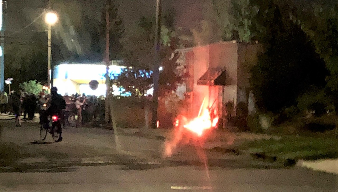 25 arrested after Portland protesters set fire to police building