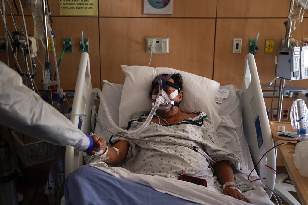Virus Outbreak-US Surge