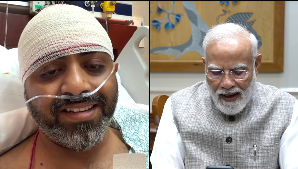 This screengrab from Narendra Modi YouTube Channel shows Indian Prime Minister Narendra Modi speaking with FlyDubai pilot Capt. Smit Machchhar on Friday, Oct. 2, 2026. 