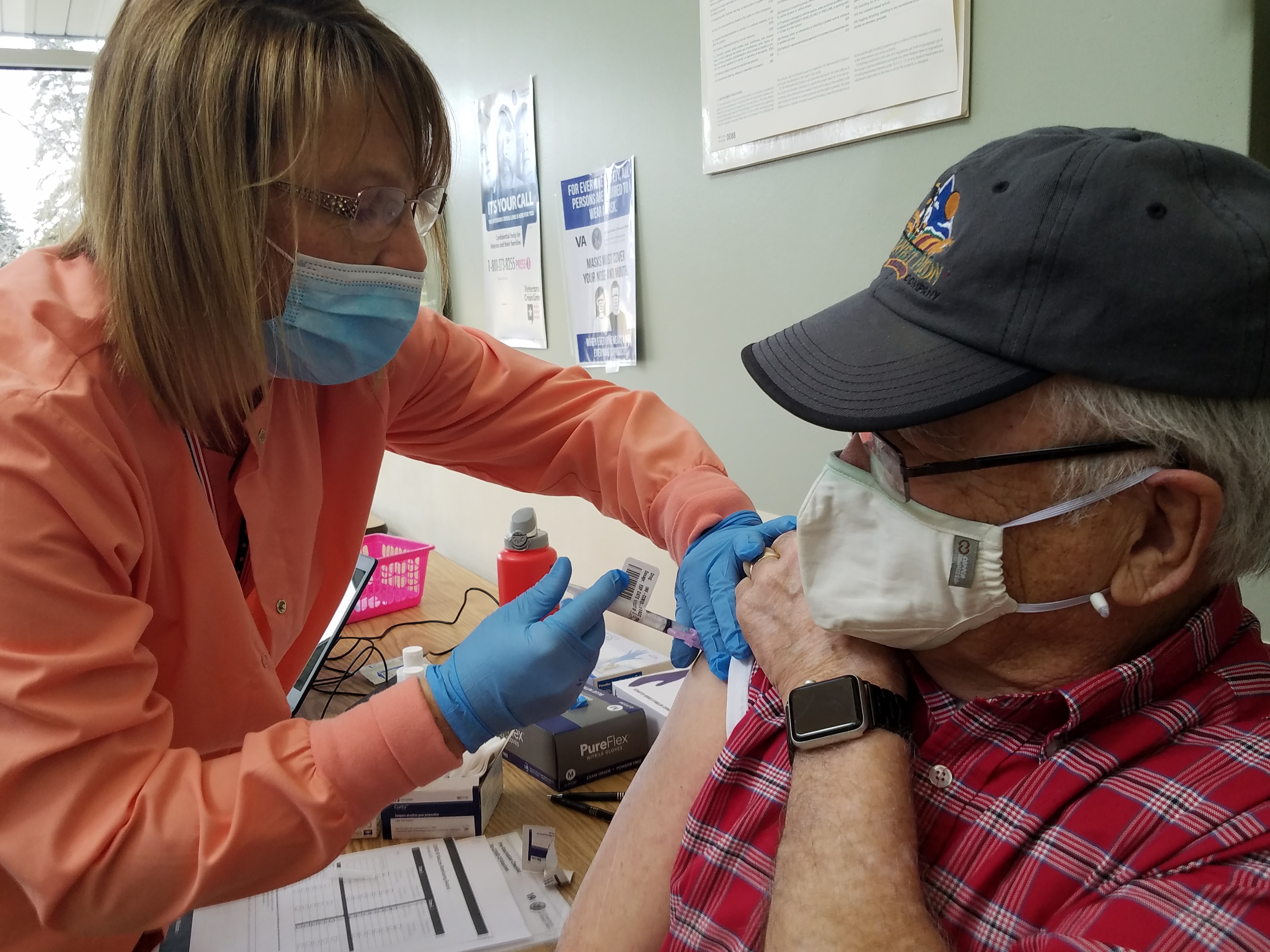 Montana veteran receiving first dose of COVID vaccine