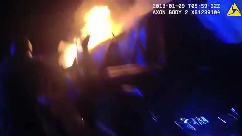 wptv-officers-rescue-driver.jpg