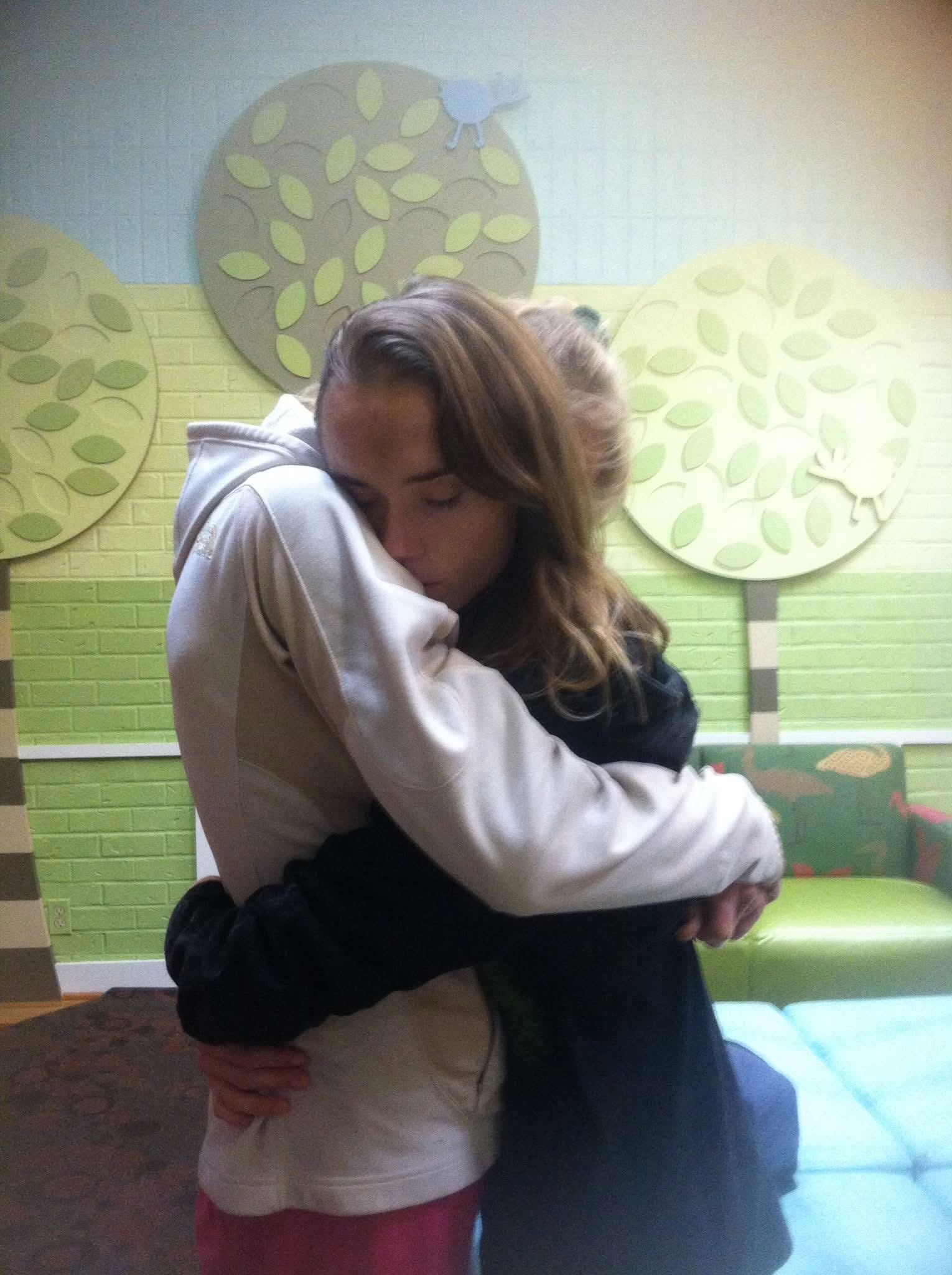 Debi Blackburn (left) hugging daughter Kaila Blackburn at Cumberland Hospital