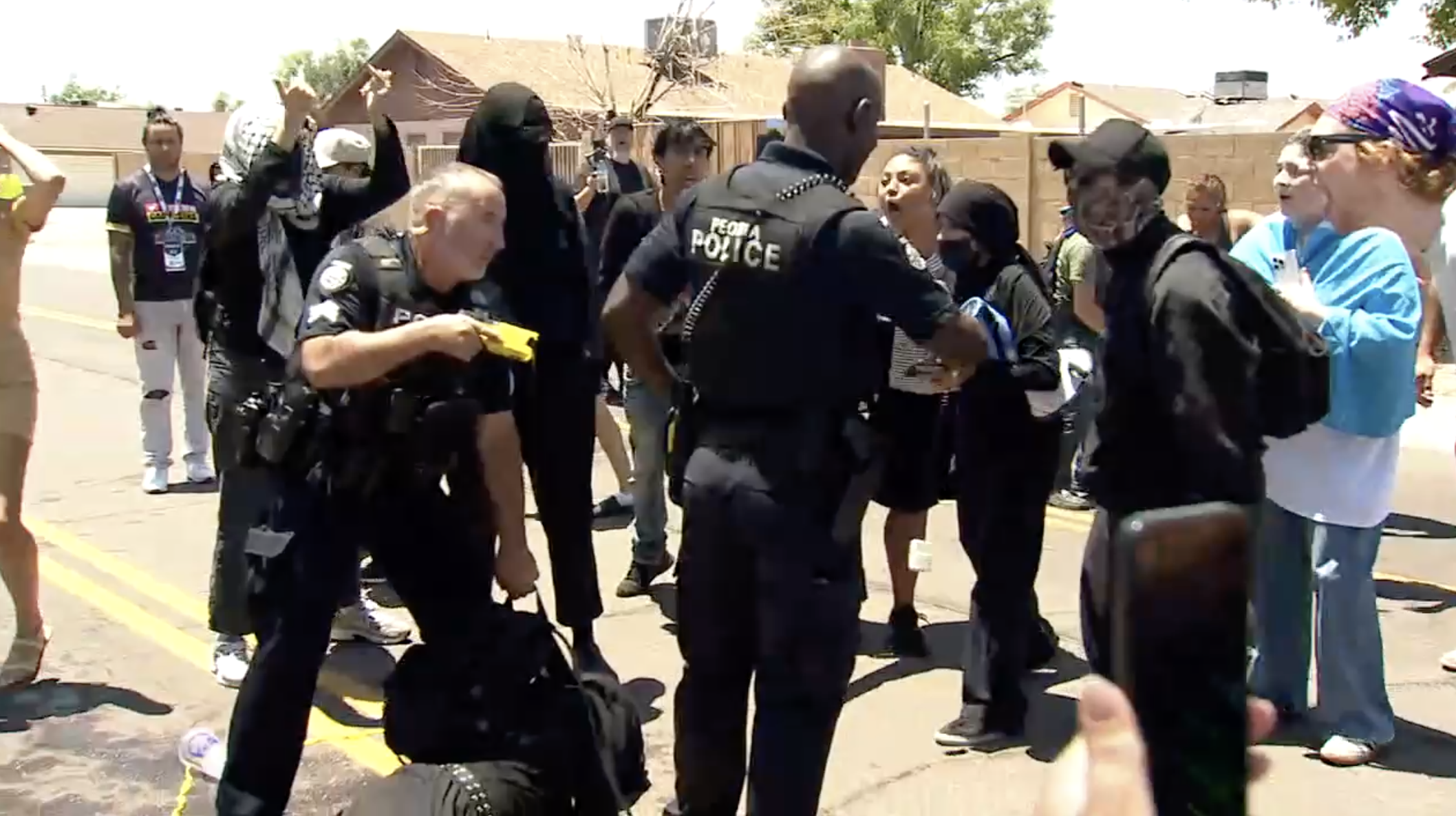 Protest in Peoria near 67th and Peoria avenues