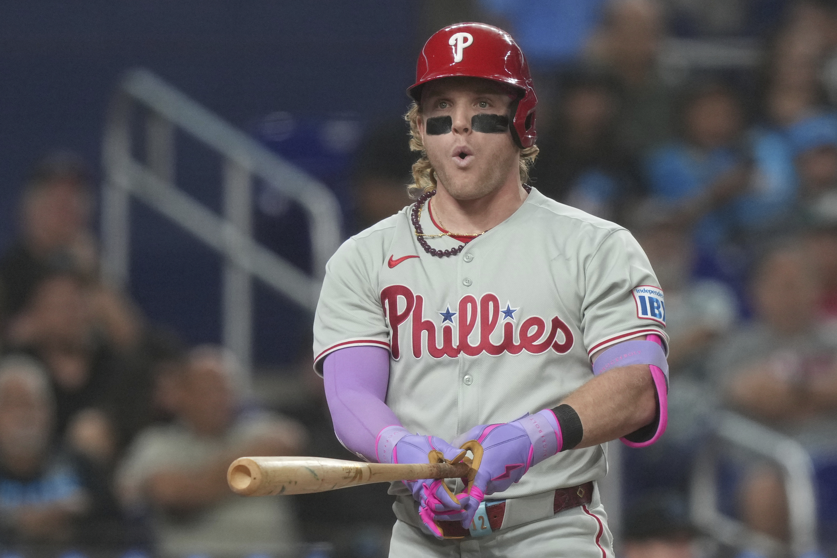 Philadelphia Phillies outfielder Harrison Bader (2) reacts after striking out during the fifth inning of a baseball game against the Miami Marlins Friday, Sept. 5, 2025, in Miami. 