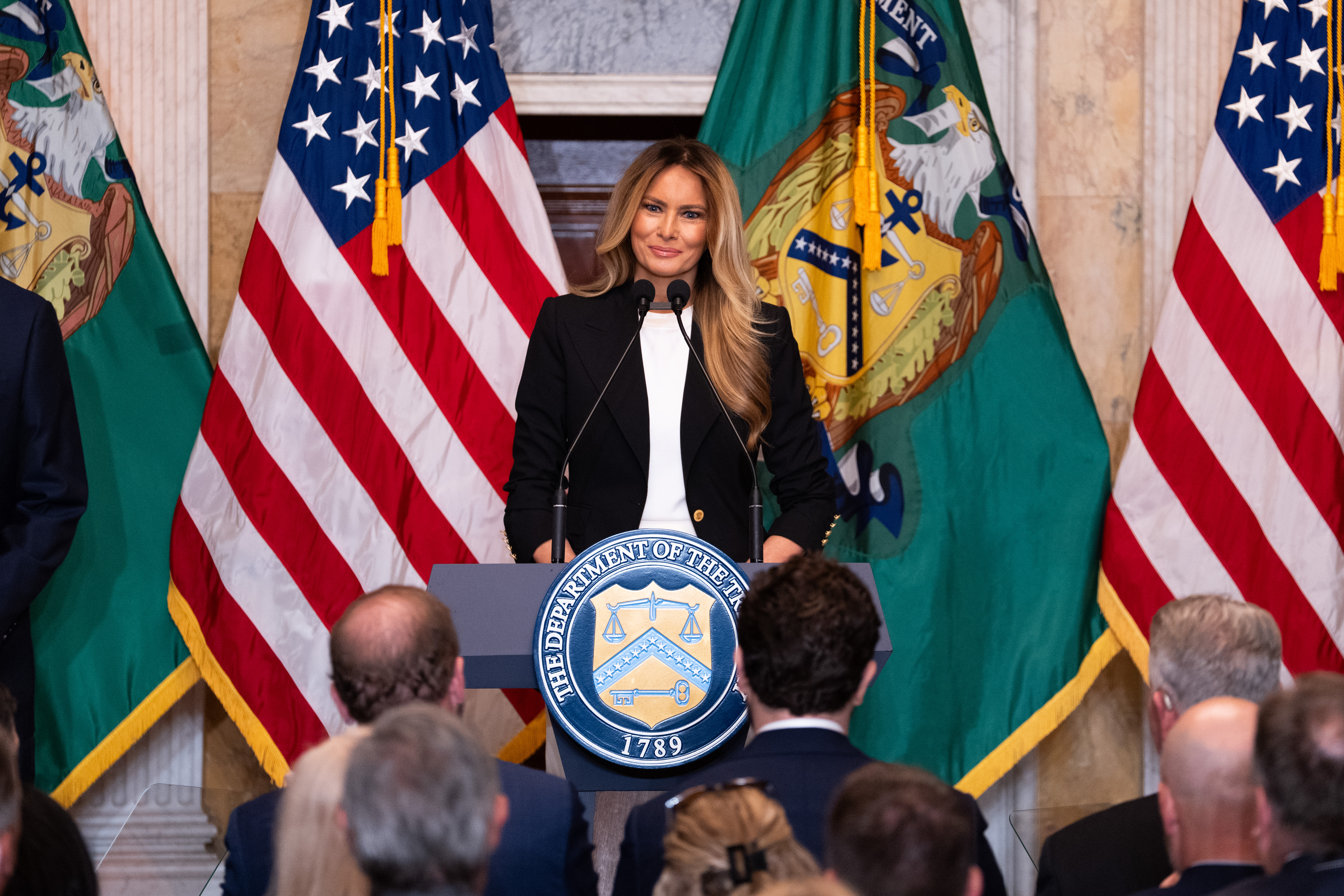 First lady Melania Trump speaks about Trump Accounts for children in foster care at the Department of Treasury, Thursday, June 11, 2026, in Washington. 