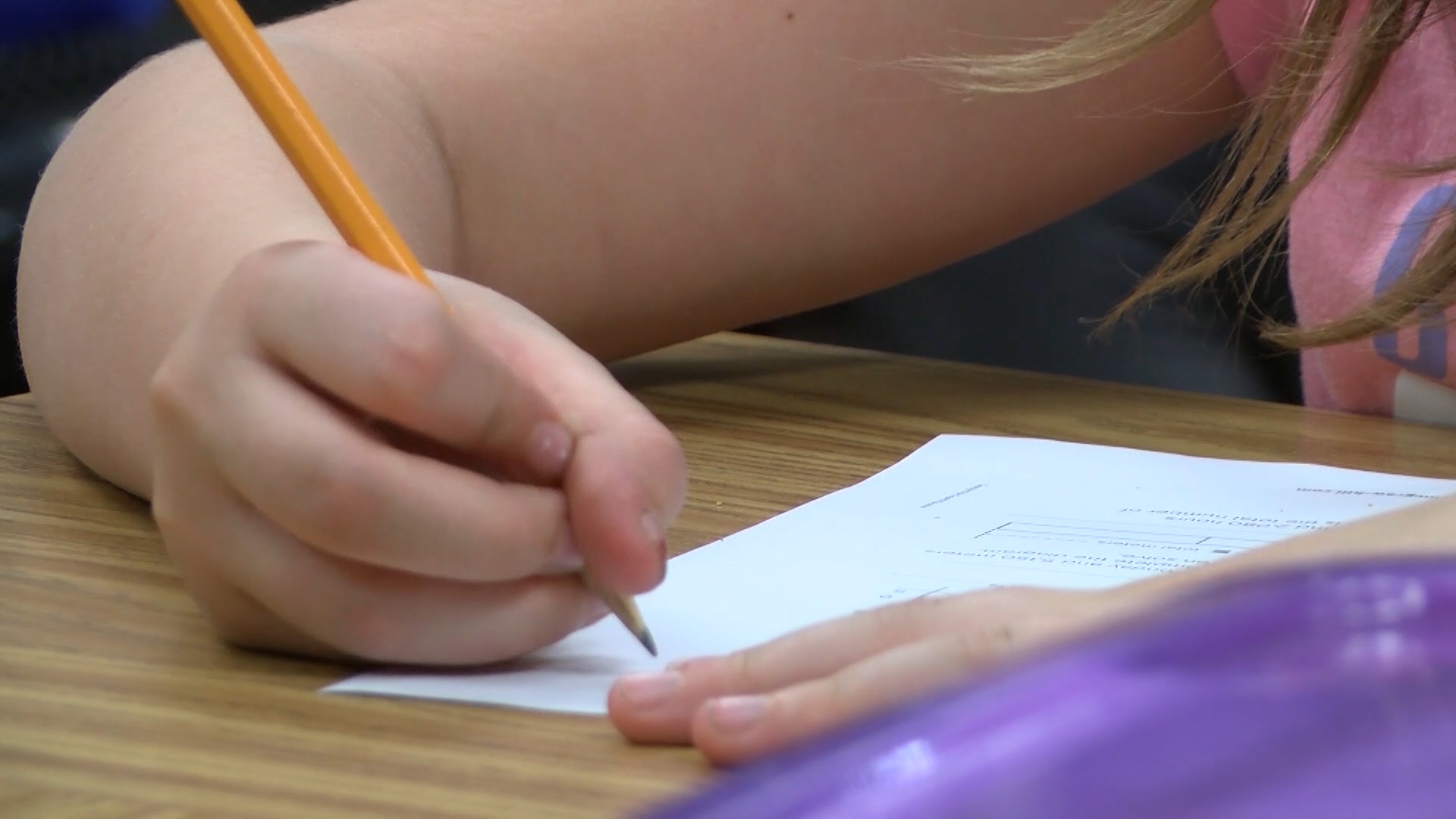 School kid writing.jpg