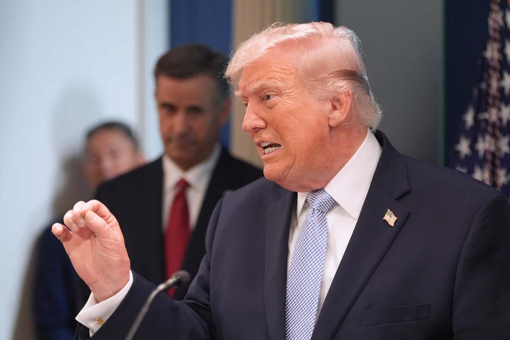 President Donald Trump speaks with reporters in the James Brady Press Briefing Room at the White House.