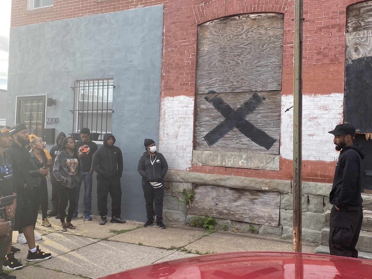 East Baltimore neighborhood hold rally to call out negligent developers