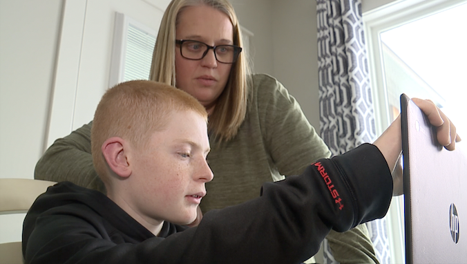 andrea marsh and son on ami day.png