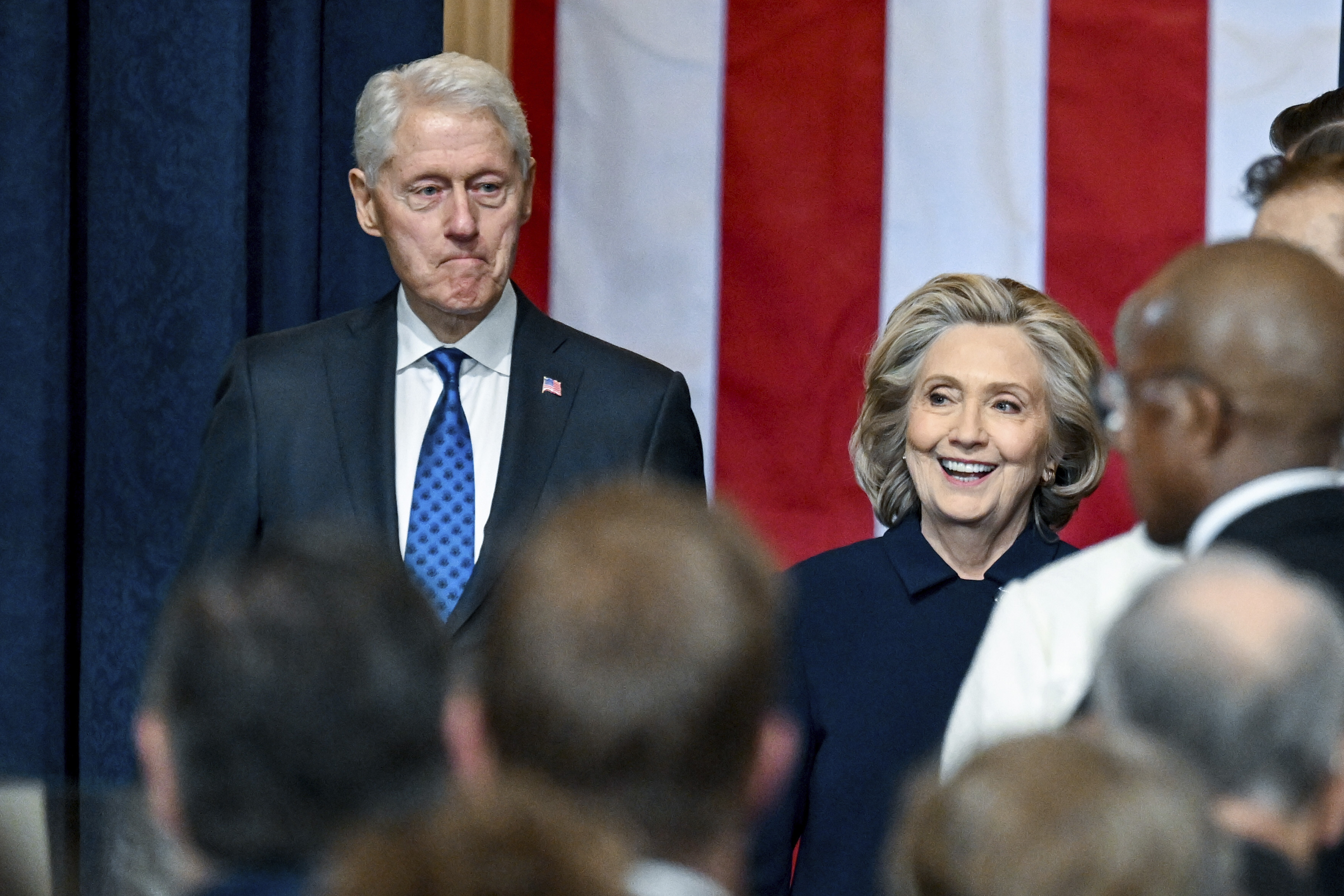 Former Secretary of State Hillary Clinton, right, and former President Bill Clinton arrive before the 60th Presidential Inauguration in the Rotunda of the U.S. Capitol in Washington, Monday, Jan. 20, 2025. 