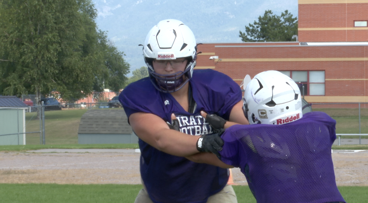 Brody Bulette doing a blocking drill against his teammate, Polson