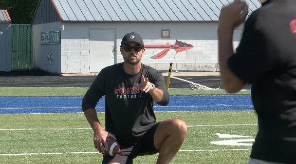 Brock Osweiler coaching kids at Win the Day Camp, Kalispell