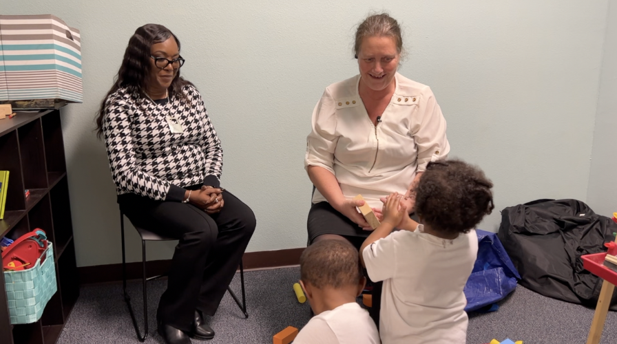Michelle and Amanda working with the children