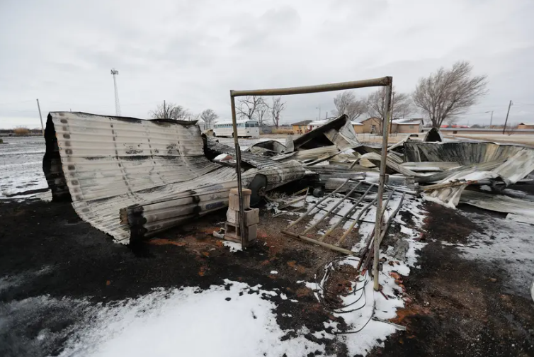 A building destroyed by fire sits in ashes at the Texas R.V. Park in Fritch. It was burned during a string of wildfires earlier this year. A Texas House committee on Wednesday investigating the fires released its report.