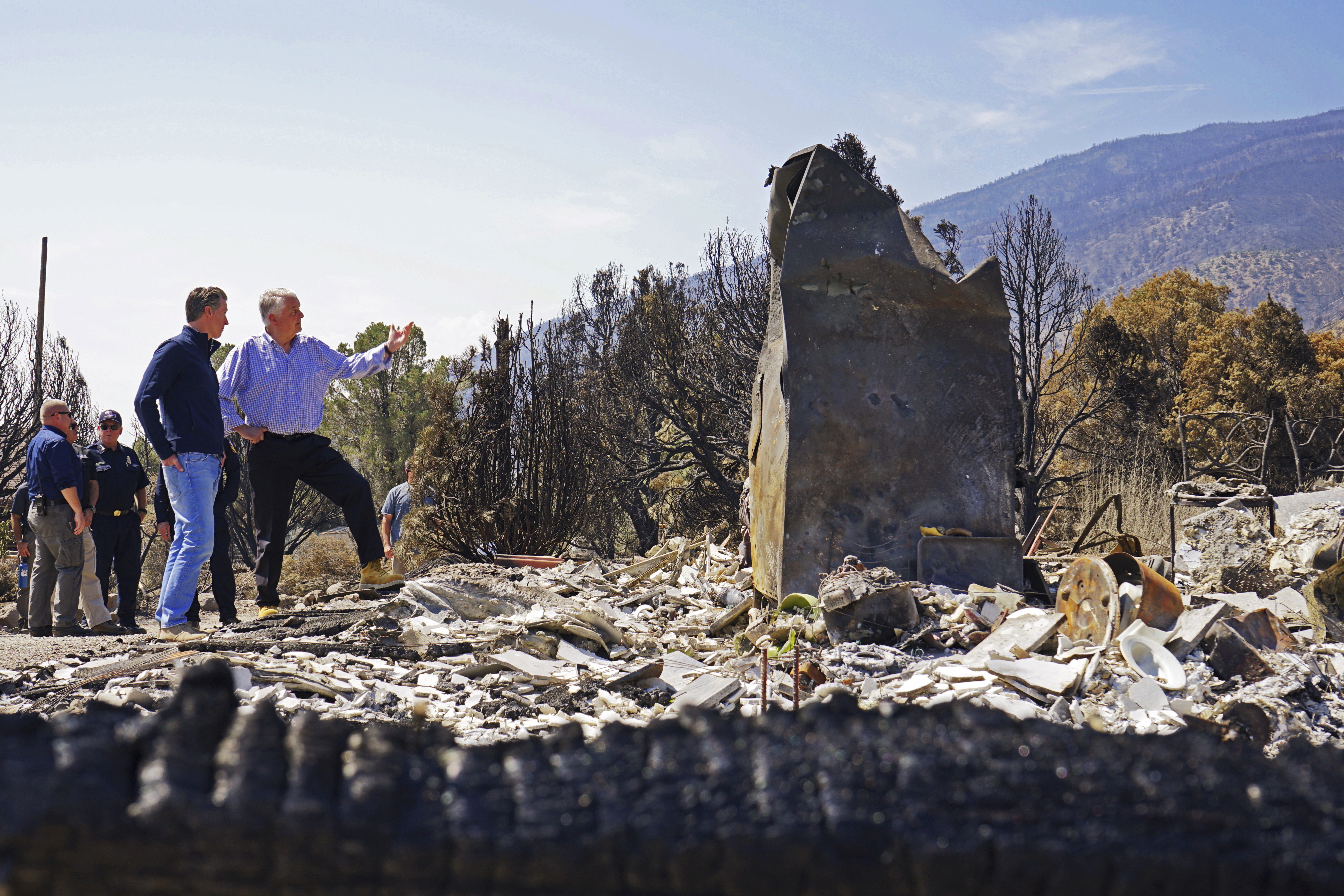 California, Nevada governors tour site of huge wildfire