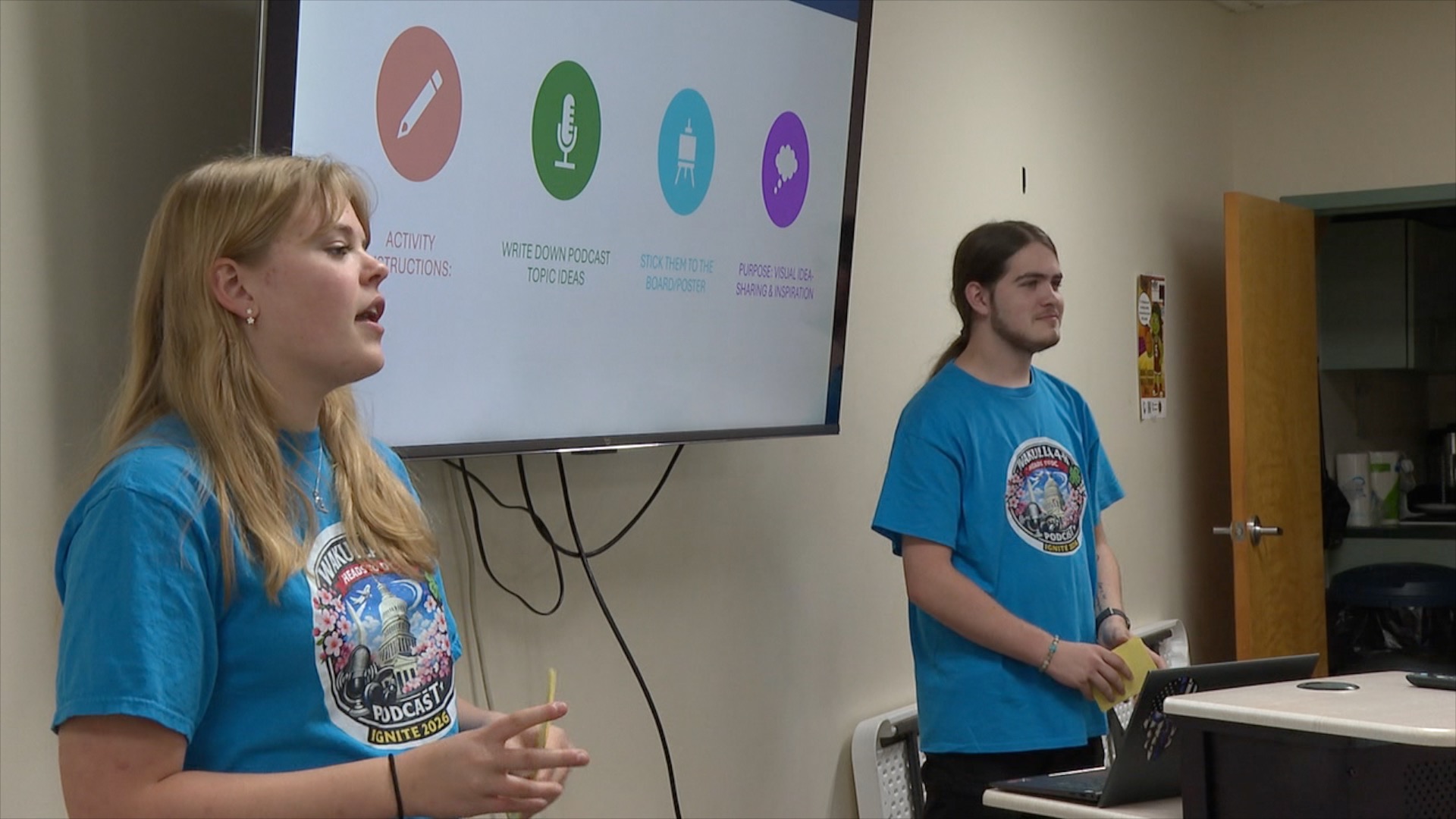 Caden Gray and Emily Zak prepare for Ignite by 4-H