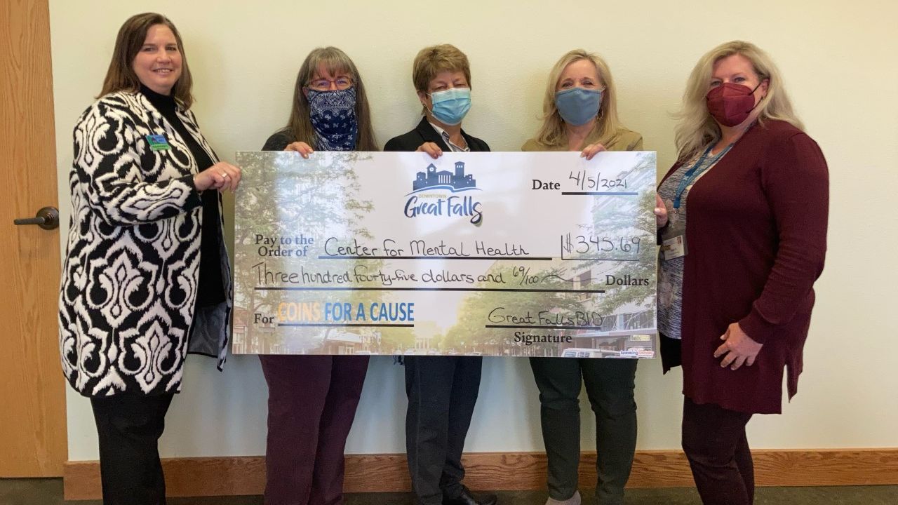 "Coins For A Cause" money donated to the Center for Mental Health 