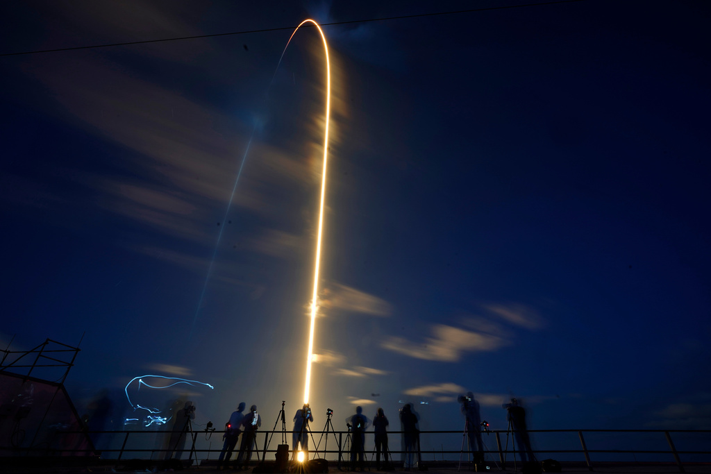 FILE - In this photo made with a long exposure, a SpaceX Falcon 9 rocket, with four private citizens onboard, lifts off from Kennedy Space Center's Launch Pad 39-A, Wednesday, Sept. 15, 2021, in Cape Canaveral, Fla. 