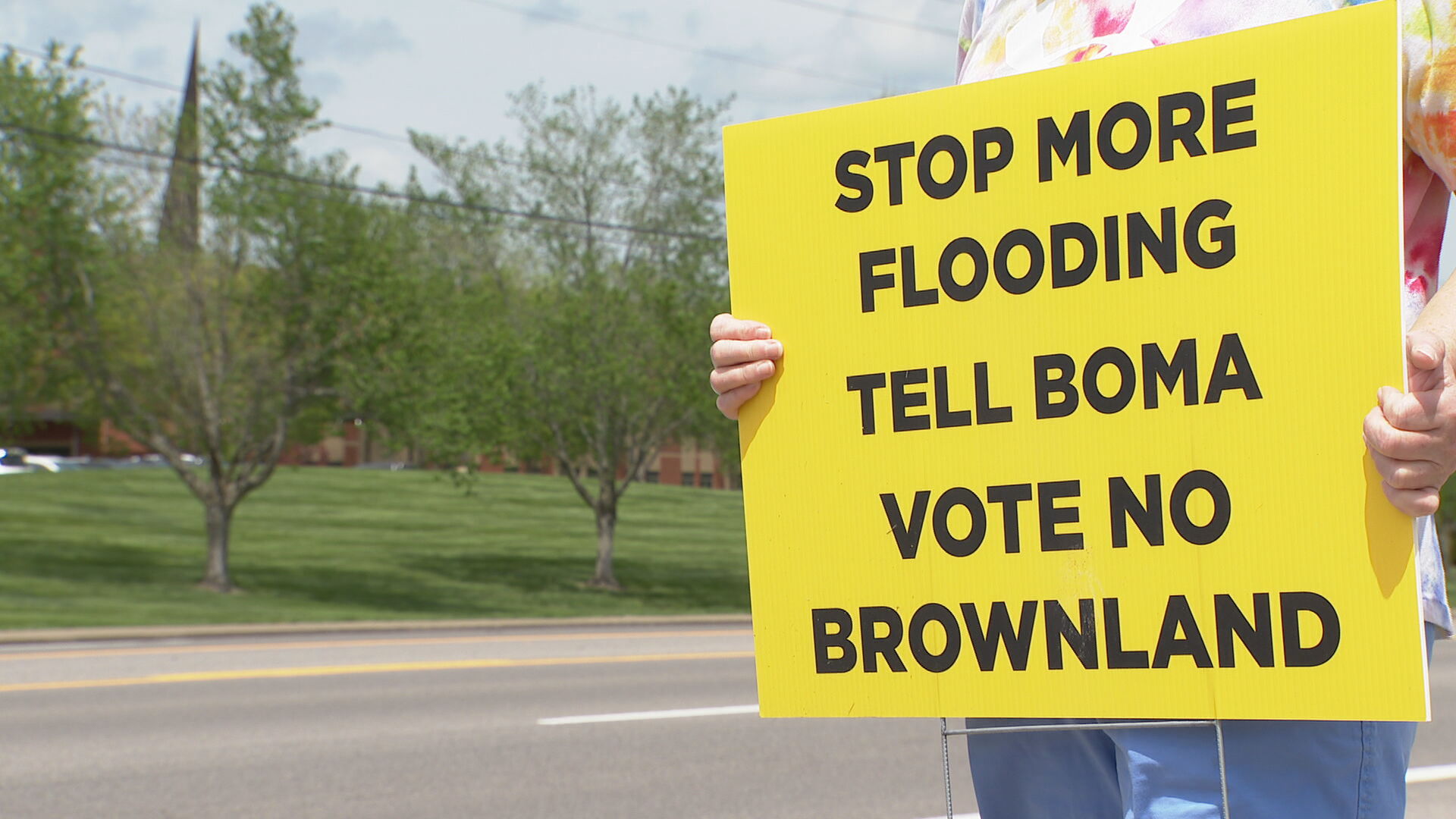 Flooding protest poster Monticello resident