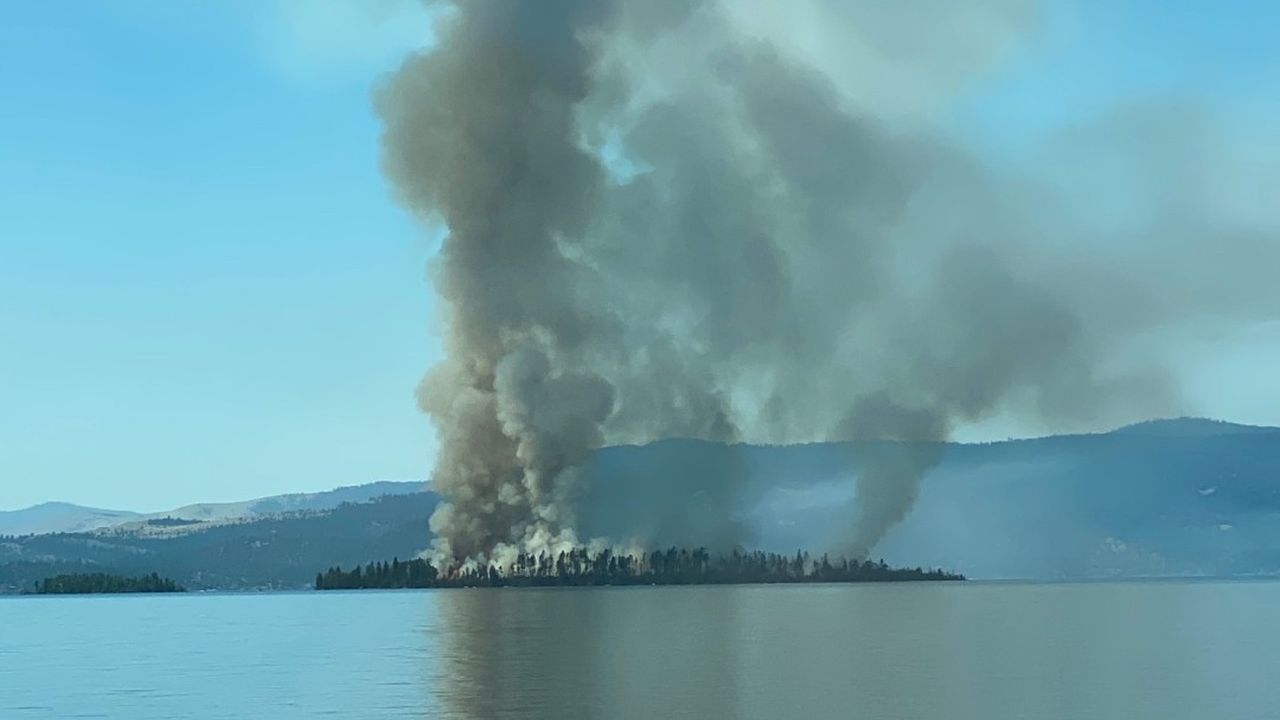 Wildfire burning on Bird Island in Flathead Lake