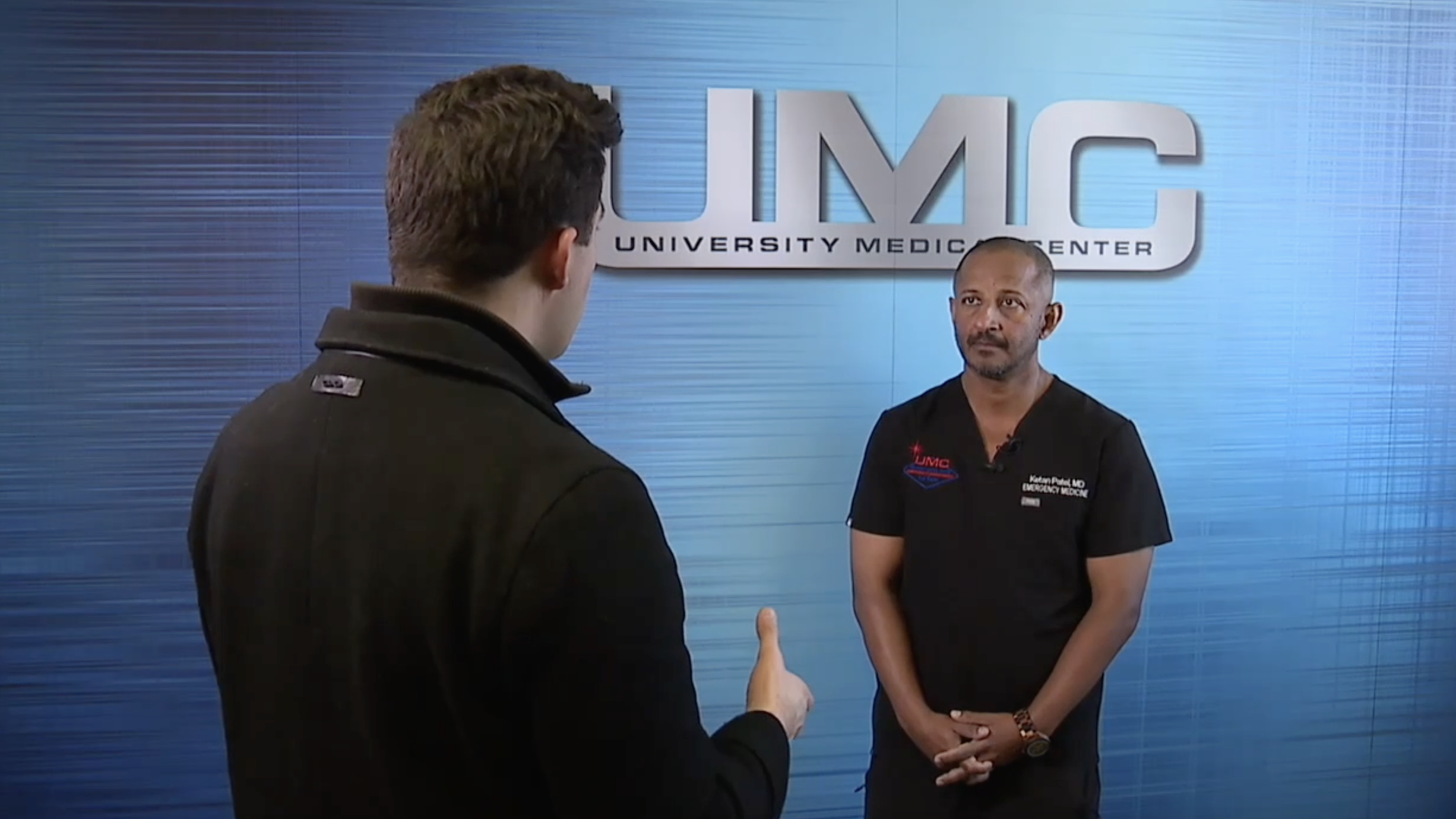 Abel Garcia talks to doctor at UMC 