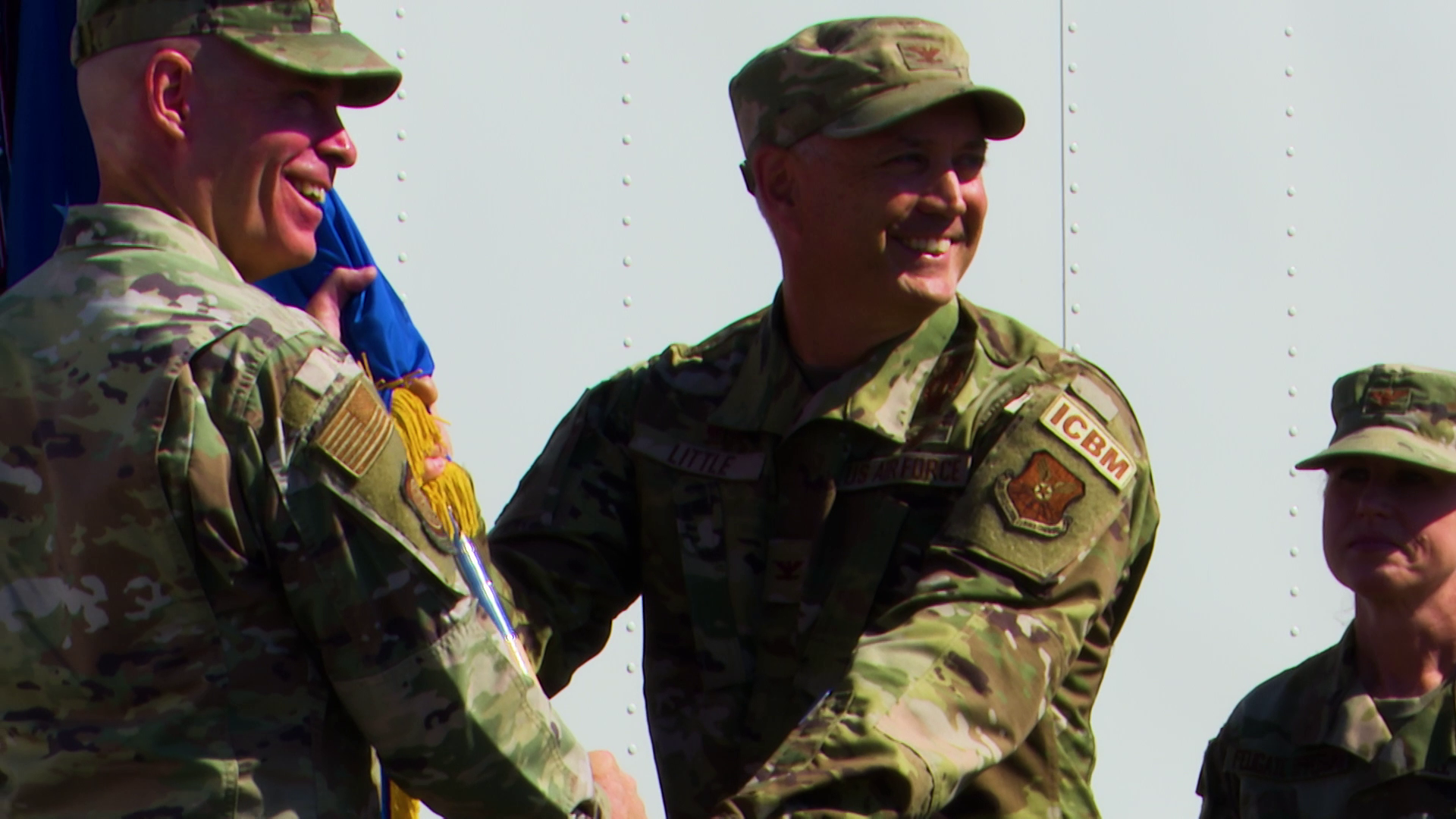 Colonel Anita Feugate Opperman relinquished command of the 341st Missile Wing to Colonel Barry Little