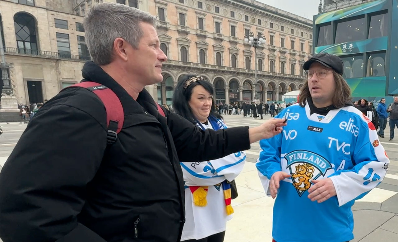WPTV anchor Mike Trim interviews fans of Team Finland in Milan, Italy, on Feb. 10, 2026.