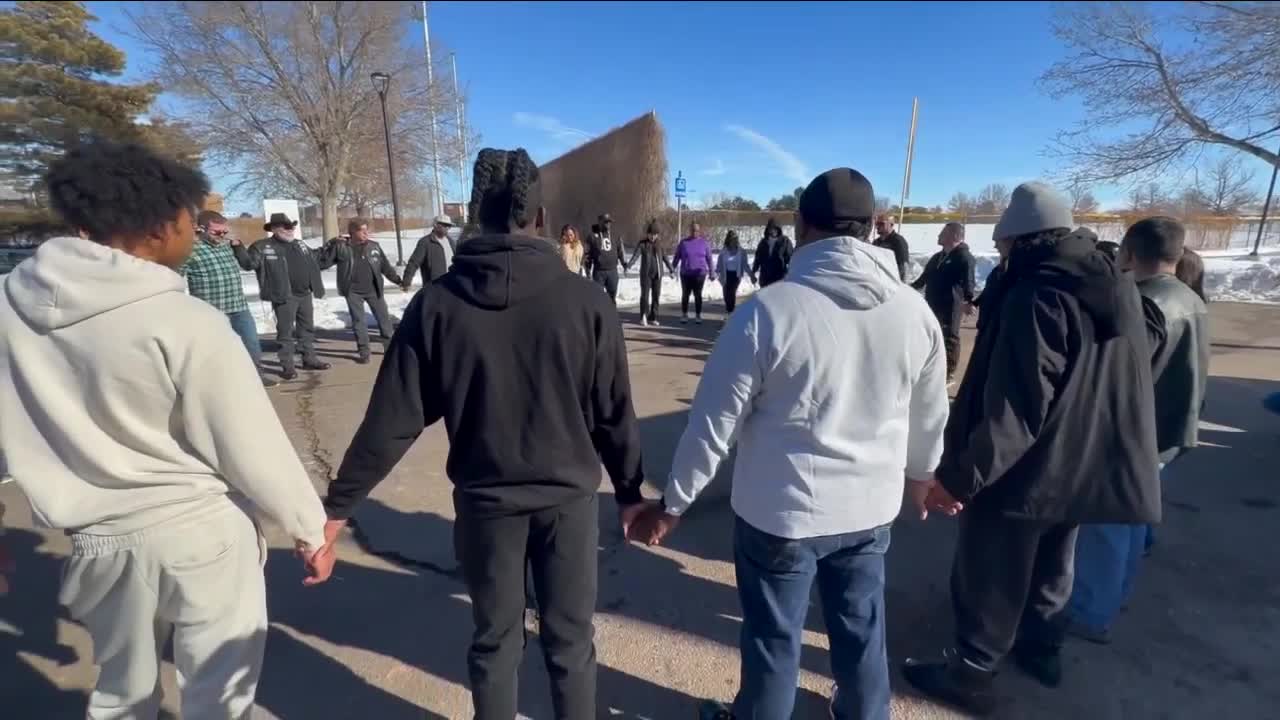 Community members gather in Denver's Montbello neighborhood after recent violence, including Tayanna Manuel's death. 