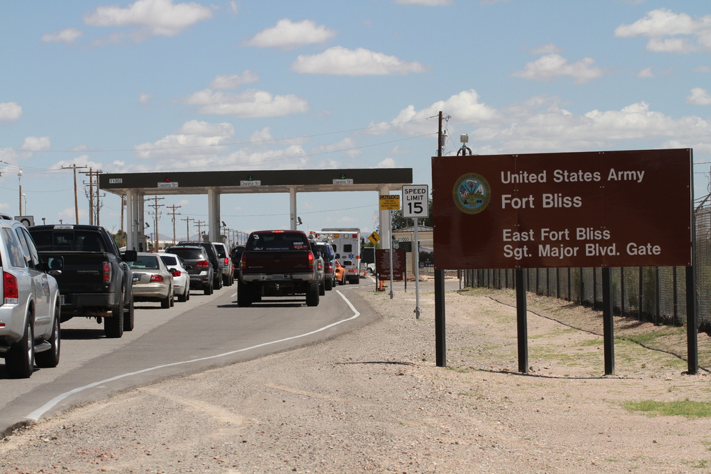 Cars wait to enter Fort Bliss in El Paso.