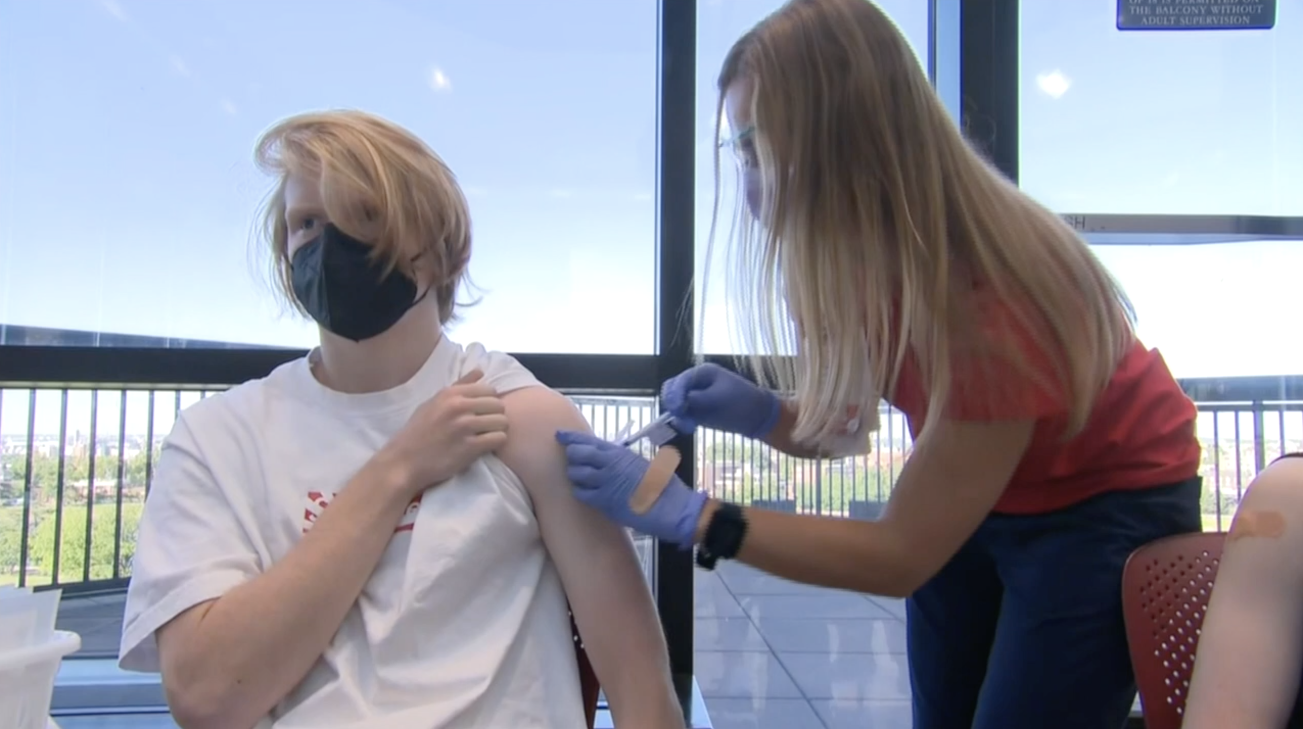 Teen receives COVID vaccine