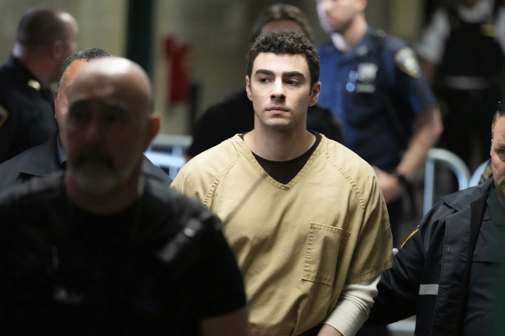 Luigi Mangione is escorted into Manhattan state court in New York, Tuesday, Sept. 16, 2025. 