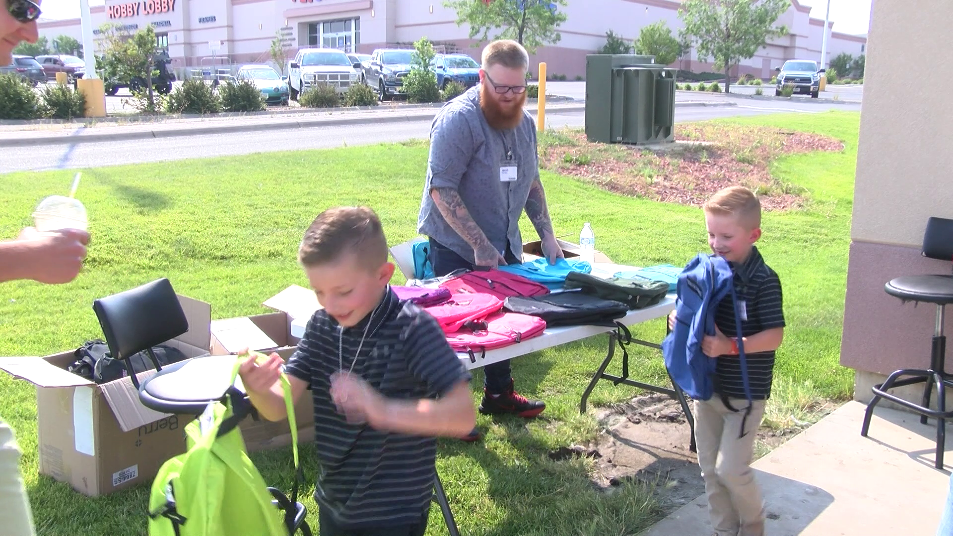 Cellular Plus gives away student backpacks in Great Falls
