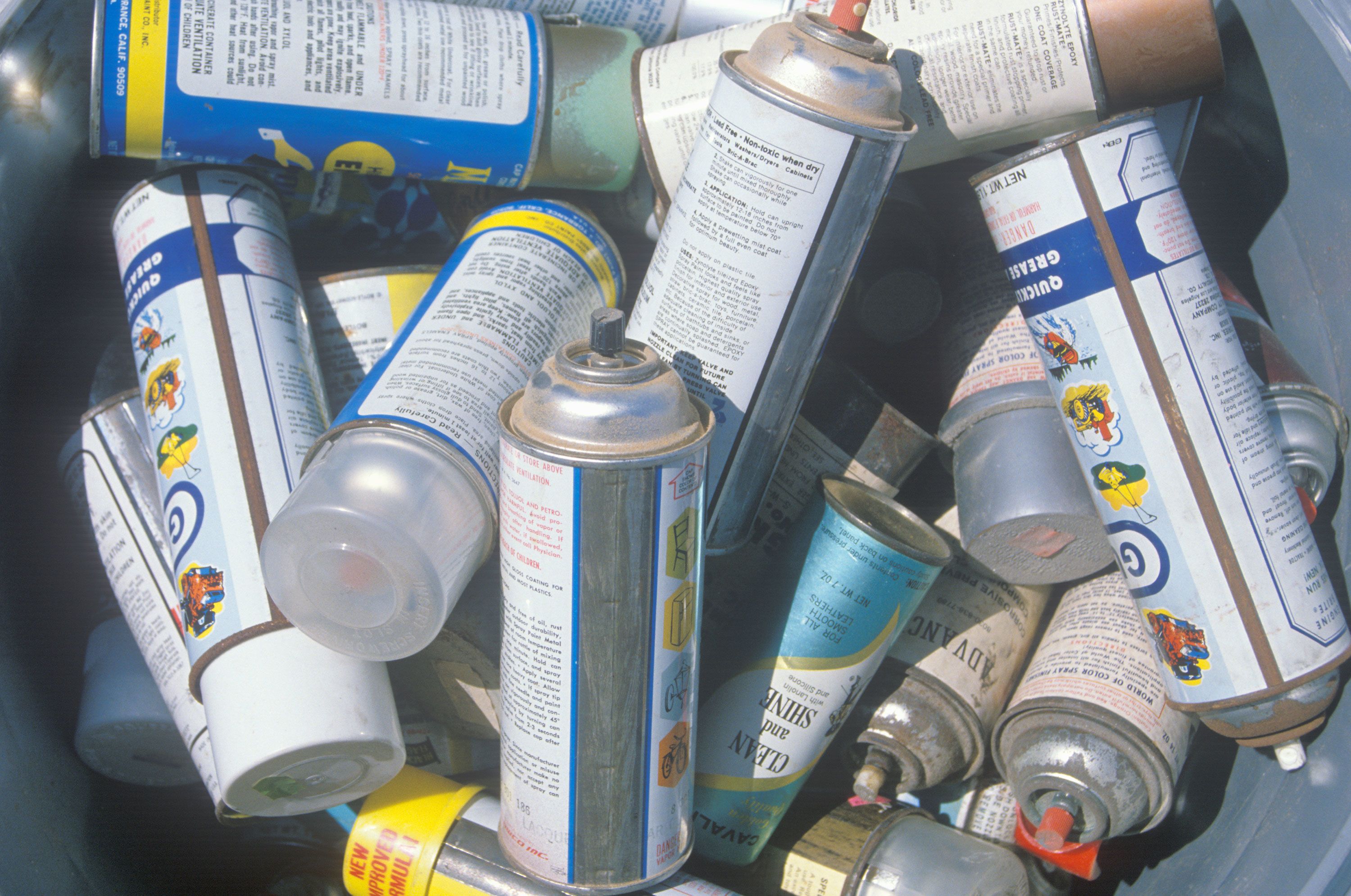 Pile of aerosol cans