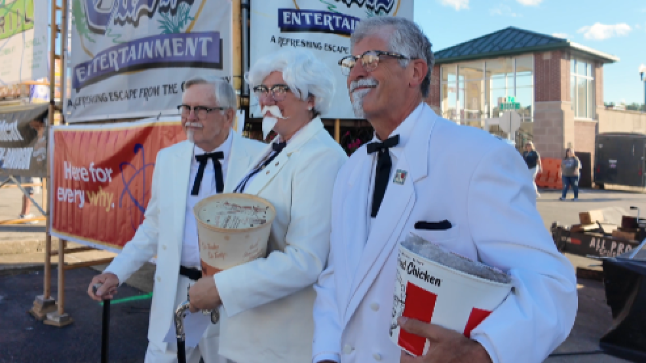 People dressed as Colonel Sanders at the World Chicken Festival.