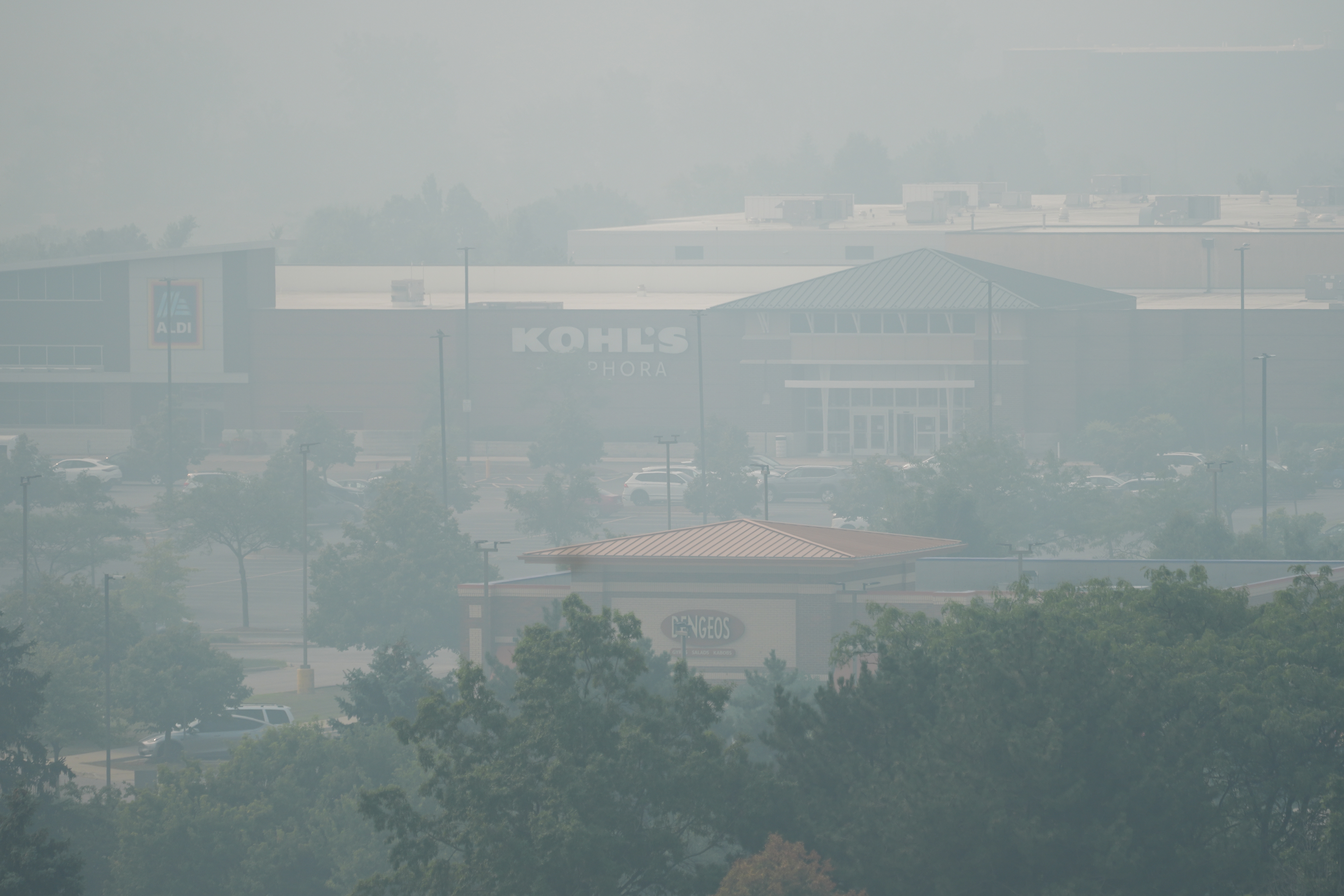 A general view of street mall during poor air quality due to dense smoke from Canadian wildfires in Northbrook, Ill., Thursday, July 16, 2026.