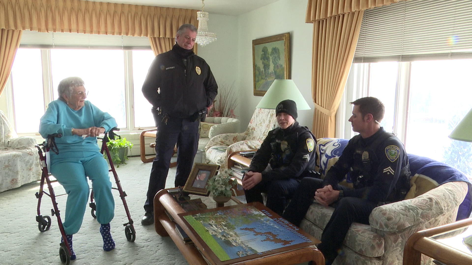 Police officers pay a surprise visit to a Great Falls woman