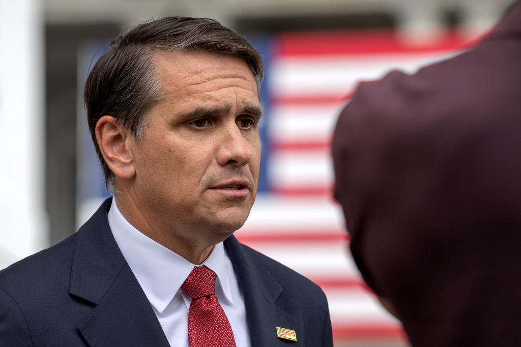 Acting Attorney General Todd Blanche speaks to a reporter outside the White House, Wednesday, May 27, 2026, in Washington. 