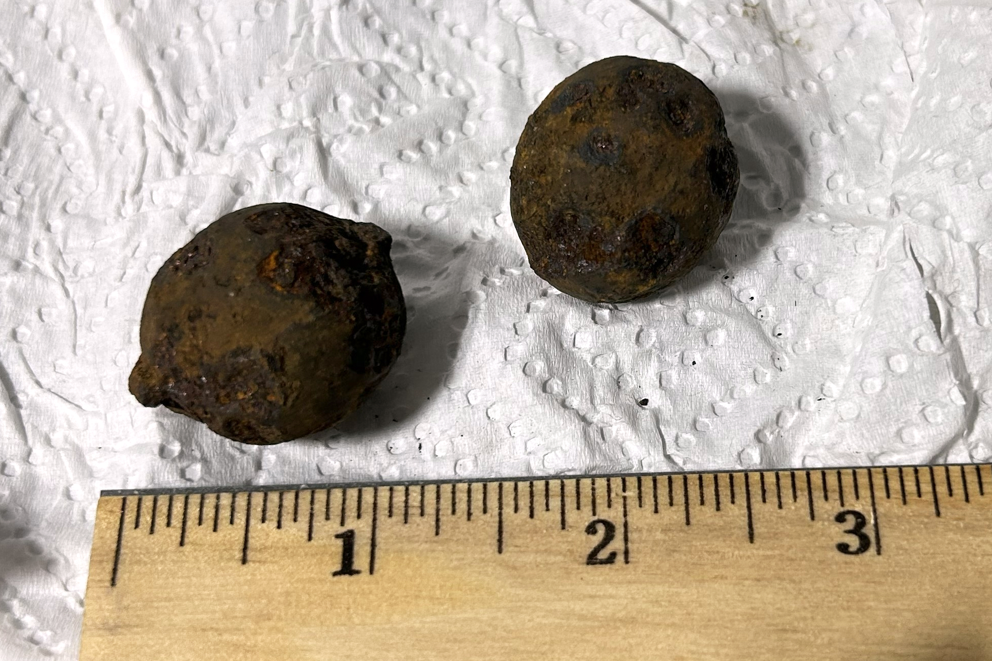 This photo provided by the Transportation Security Administration (TSA) shows two stolen Civil War-era cannonballs discovered by TSA officers in a checked bag at the Gulf Shores International Airport in Gulf Shores, Ala., on July 18, 2026.