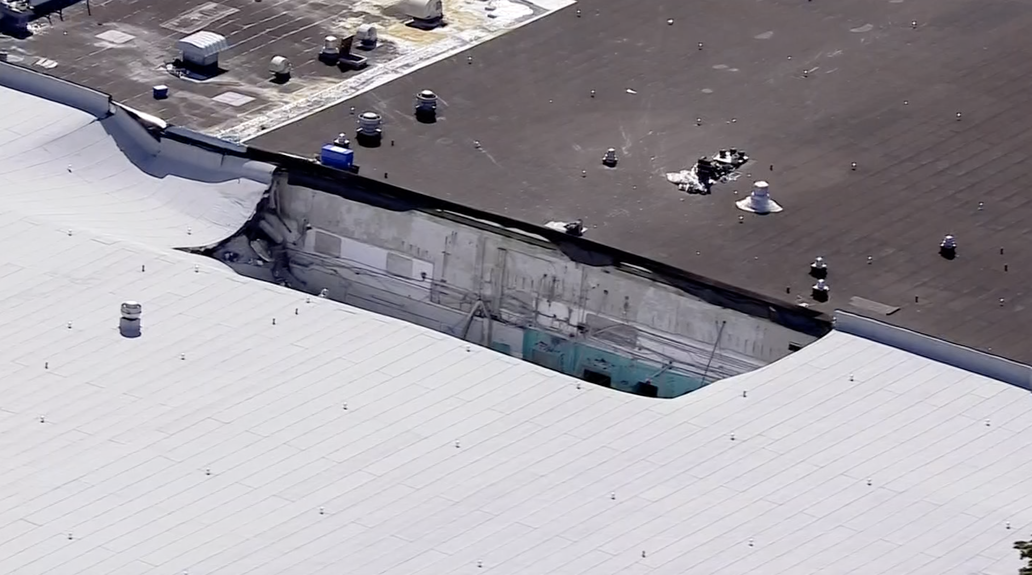 Aerial view of partial roof collapse at James S. Rickards Middle School