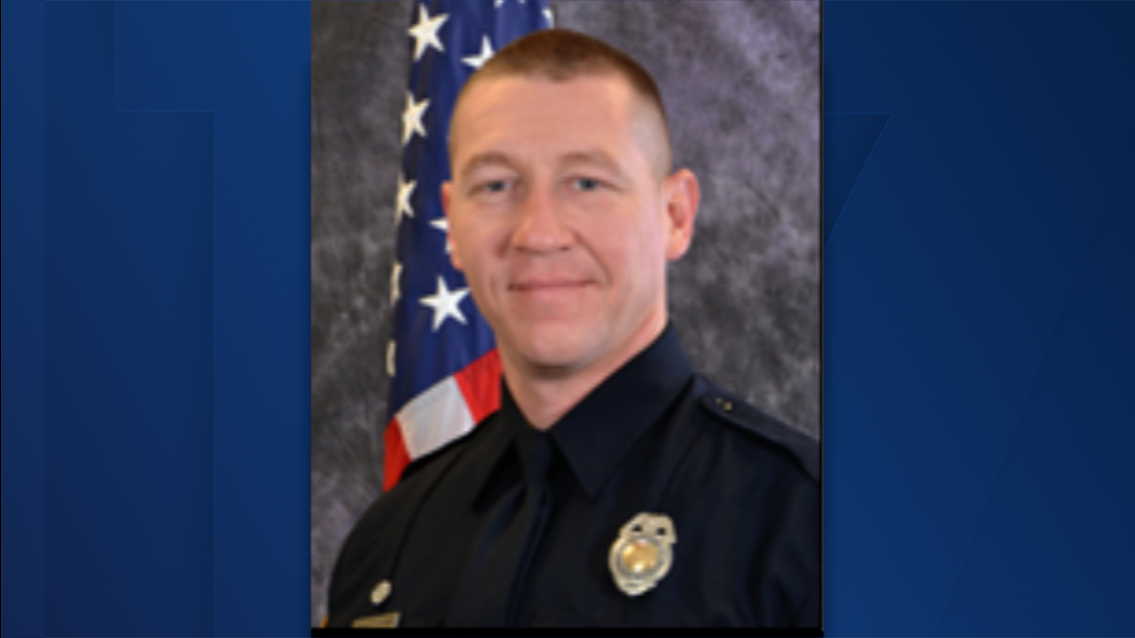 Officer Greg Bauer with GRPD.png