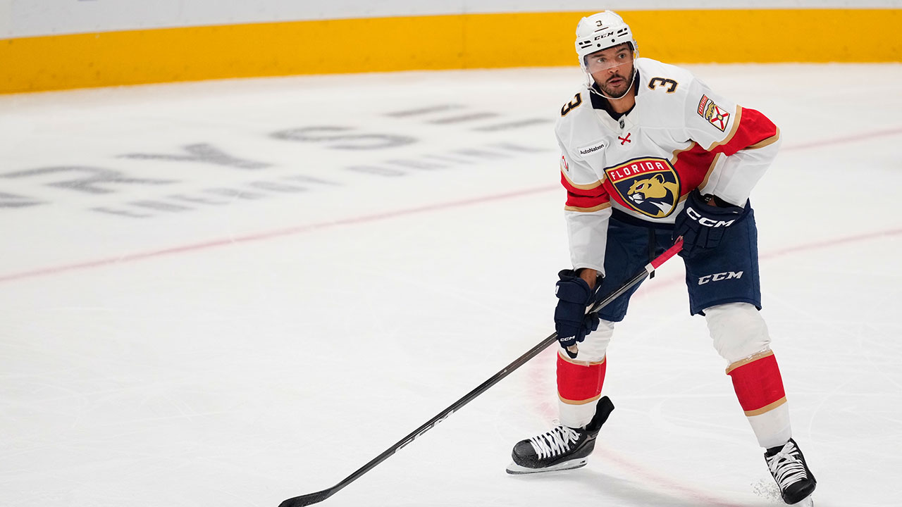Florida Panthers defenseman Seth Jones looks to make a pass during an NHL hockey game against the Dallas Stars in Dallas, Saturday, Dec. 13, 2025. (AP Photo/Tony Gutierrez)