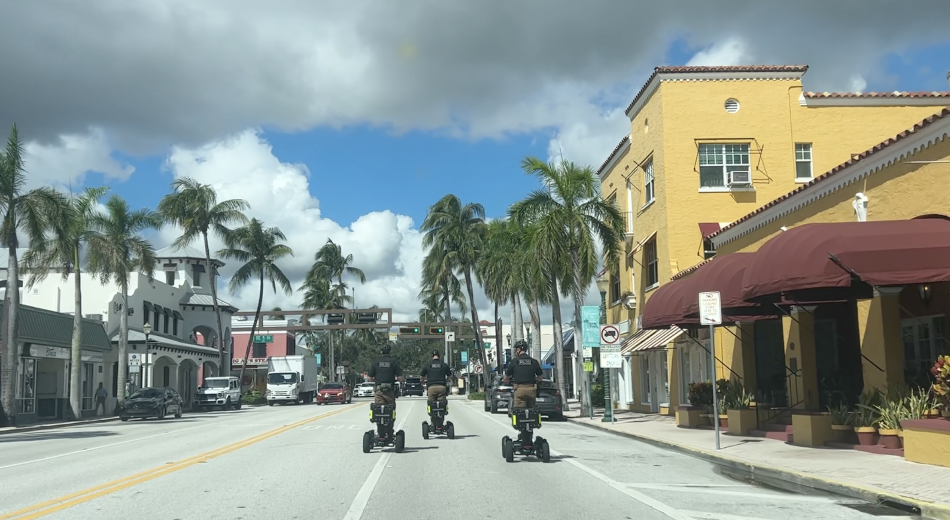 Delray Beach police on scooter.png