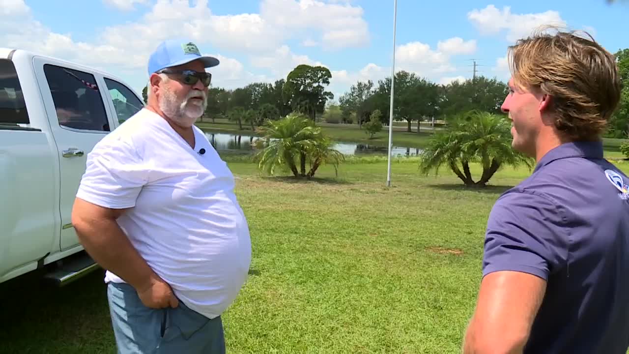 Tyler Hatfield and resident talking about opportunity zones in Port St Lucie.jpg