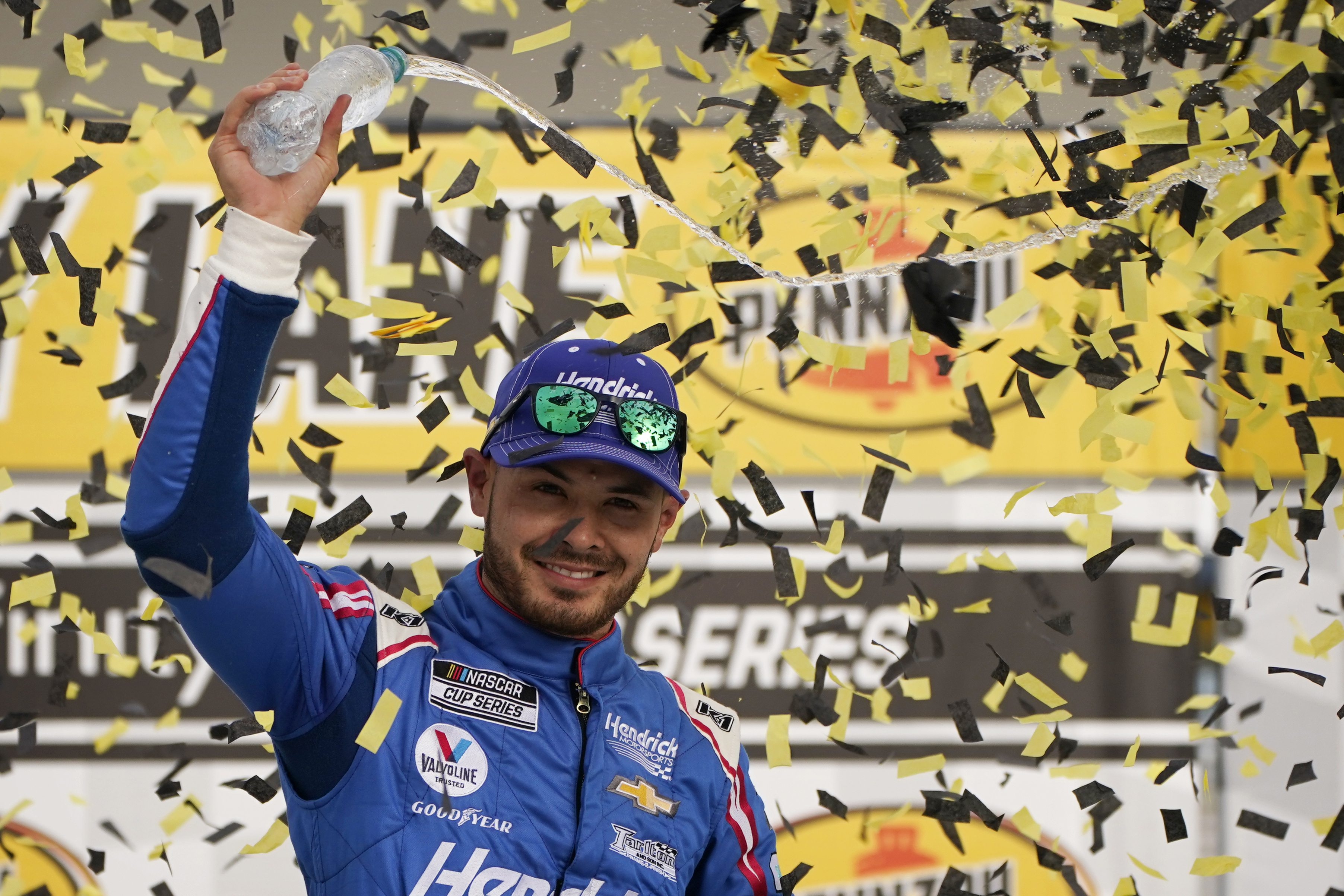Kyle Larson celebrates return with 1st win since suspension